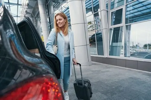 Taxi van HTC, klaar voor een rit van deur tot deur