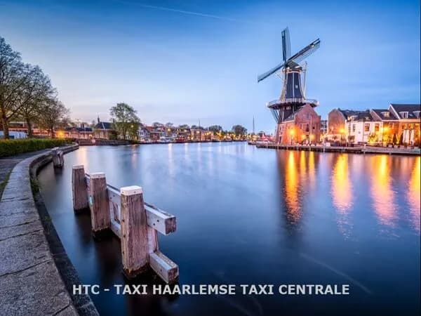 Haarlem's windmill on the river Spaarne in the evening